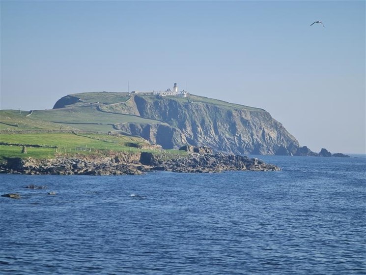 An island with a lighthouse on it